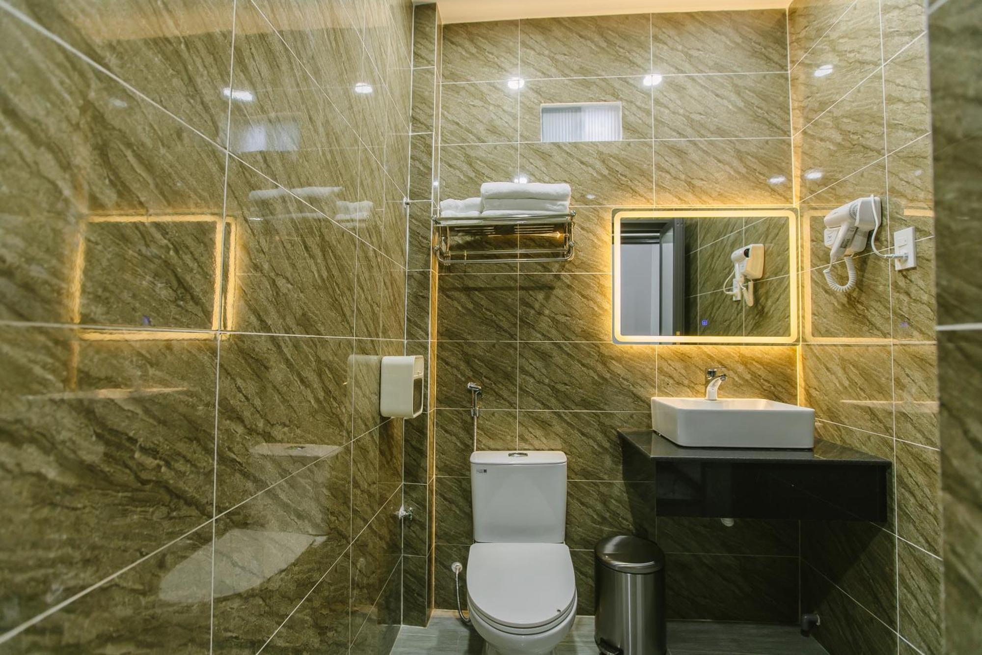 Peony Hotel Кан То Екстериор снимка